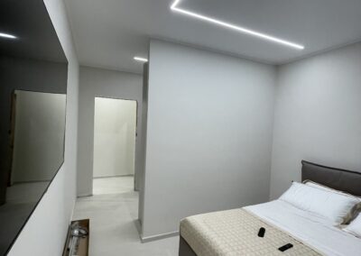 Impianto illuminazione LED Milano Cologno Monzese con strisce soffitto colore freddo lavoro camera da letto ristrutturazione design
